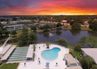 Seminole Gardens community pool area at sunset